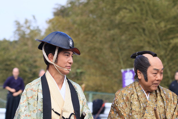 お代官様